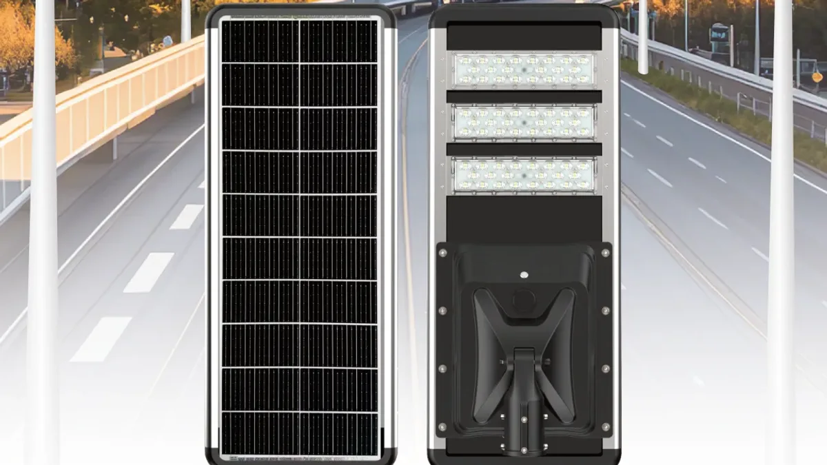Integrated solar street light housing where the solar panel, battery pack behind the battery cover, controller and LED driver share one IP65 body