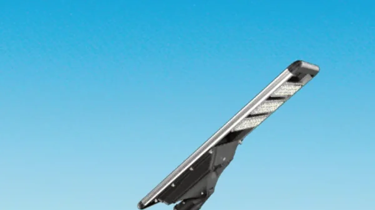 VOLTIC ZHENYE SERIES integrated solar street light showing the monocrystalline solar panel and the downward-facing LED modules that set its light distribution and glare behaviour